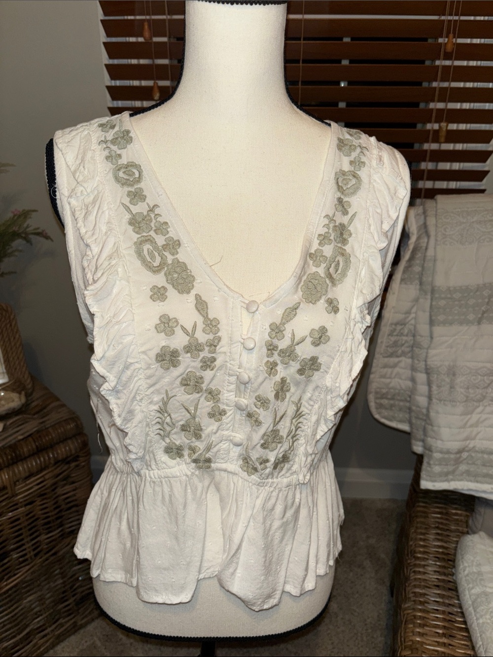 Sleeveless White Embroidered Peplum Crop Top